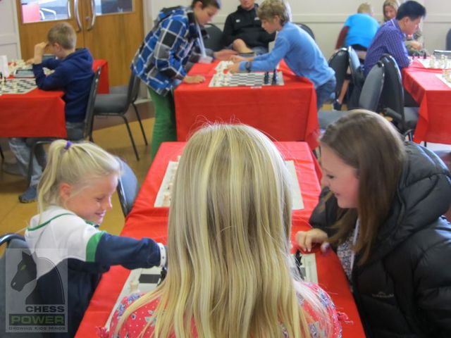 Girls having fun with Chess