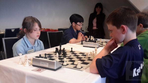 Like the famous Mikhail Tal, Findlay Lister stares down Sylvia McDougall