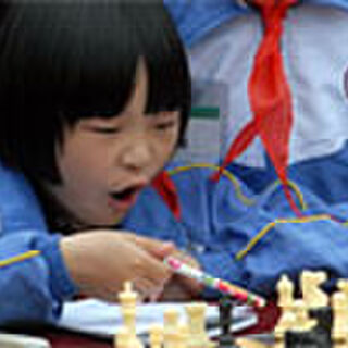Hou beats Gu, loses to Ding, remains in the lead